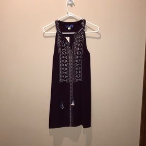 Purple dress with tassels